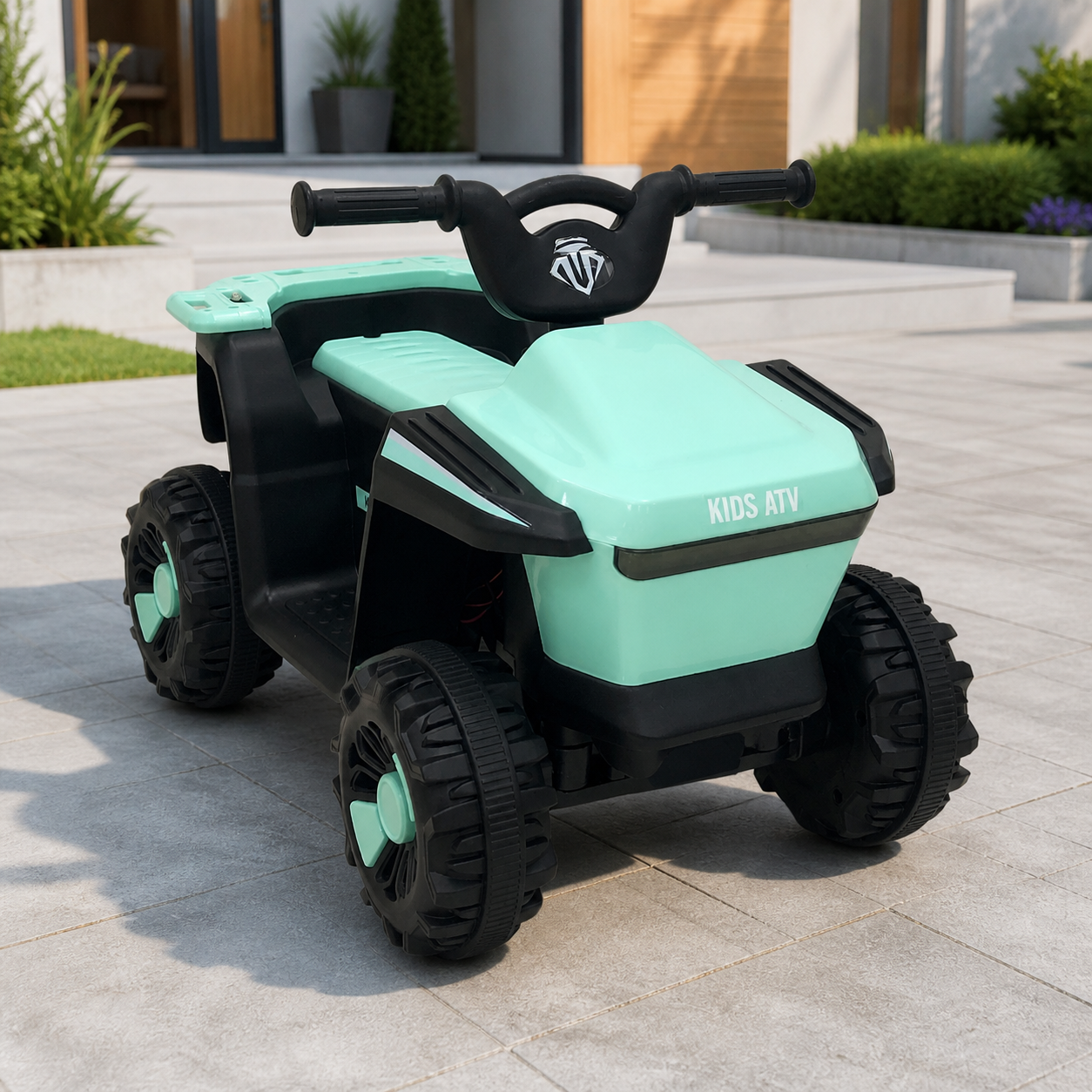 Cuatrimoto infantil verde en ambiente