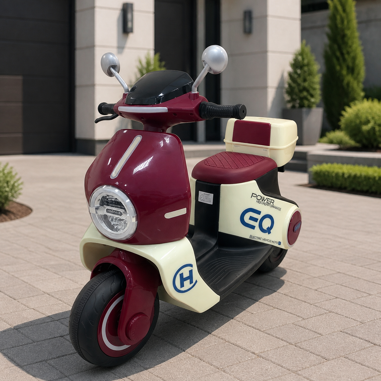 Scooter infantil crema y vino en ambiente