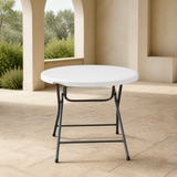 Mesa Plastica 80Cm Redonda Plegable Blanca Esp 4.5Cm en ambiente exterior