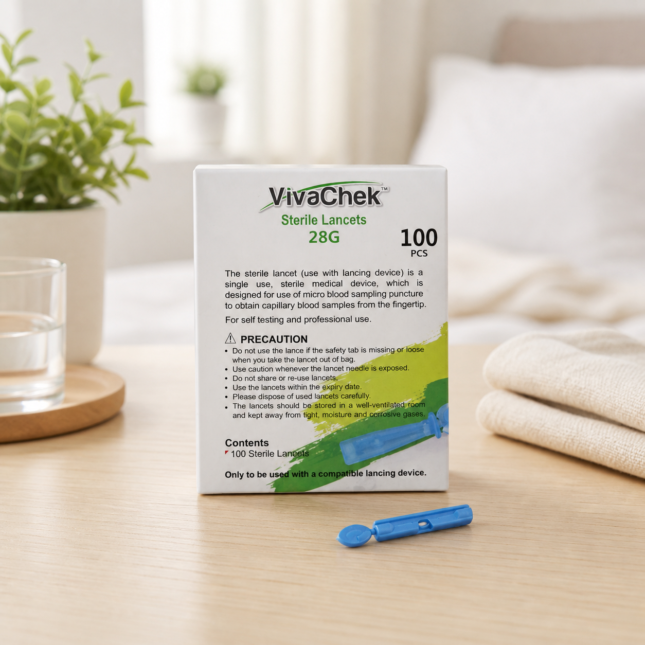 Caja de 100 lancetas VivaChek en espacio de cuidado personal