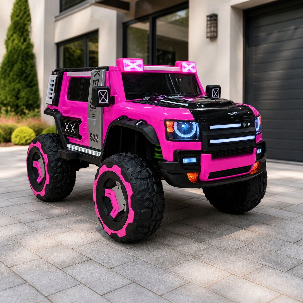 Jeep eléctrico montable Defender rosado en ambiente